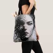 Fading grayscale pixel portrait with emotion tasche (Von Nahem)