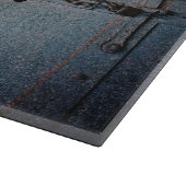 Fahren Sie mit der Vorsicht blau-grauen Industriet Schneidebrett (Ecke)