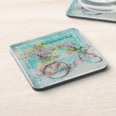 Fahrrad mit Blume-Körben auf blauem Schoß Untersetzer (Linke Seite)