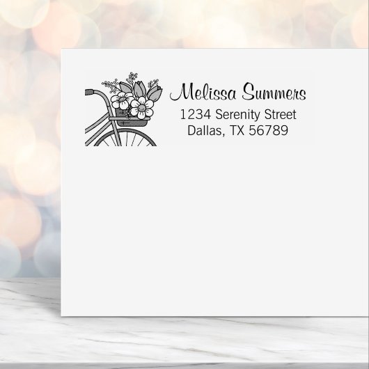 Fahrrad mit einer Blume-Korbadresse Permastempel