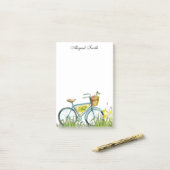 Fahrrad mit Körbchen von Blume nach der Eingabe Post-it Klebezettel (Auf Schreibtisch)