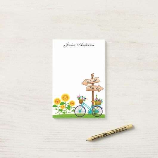 Fahrrad mit Körbchen von Blume nach der Eingabe Post-it Klebezettel (Auf Schreibtisch)