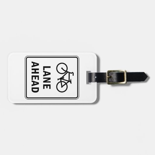 Fahrradbahn vor dem Schild Straßenverkehrssicherhe Gepäckanhänger (Vorderseite horizontal)