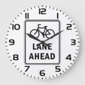 Fahrradbahn vor dem Schild Straßenverkehrssicherhe Große Wanduhr (Vorderseite)