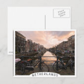 Fahrräder bei Sonnenuntergang in Amsterdam Postkarte (Vorne/Hinten)