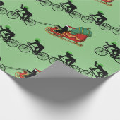 Fahrräder ziehen Santa's Schlitten Geschenkpapier (Ecke)