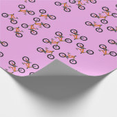 Fahrradmuster auf Rosa Geschenkpapier (Ecke)