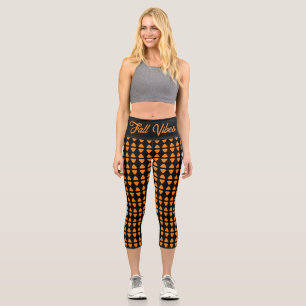 Fallvibes, orangefarbenes, geometrisches Muster Capri Leggings