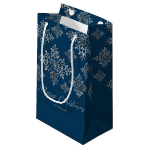 Falsche graue Folien-Schneeflocken auf Blau (keine Kleine Geschenktüte