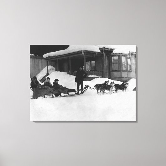 Familie mit Schlitten in Alaska Leinwanddruck (Vorderseite)