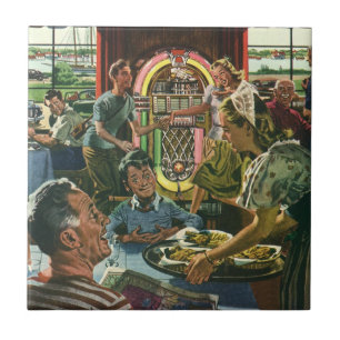 Familienessen im Retro-Diner mit einer Jukebox Fliese