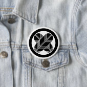 [Familienwappen] Gekreuzte Habichtfedern mit Kreis Button (Beispiel)