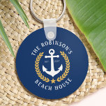 Family Name Beach House Anchor Gold Laurel Navy Schlüsselanhänger<br><div class="desc">A stylish nautical themed Keychain with your personalized family name and beach house, lake house, or other desired text with its established date. Features a custom designed boat anchor with gold style laurel leaves and a star on navy blue or easily customize the base color to match your current decor...</div>