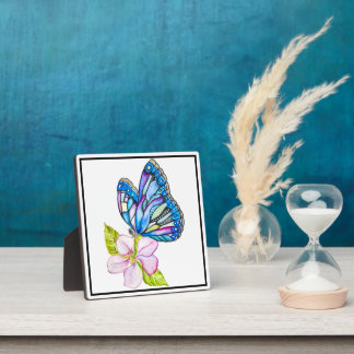 Fantasieblauer Schmetterling auf Apfelblüte Fotoplatte