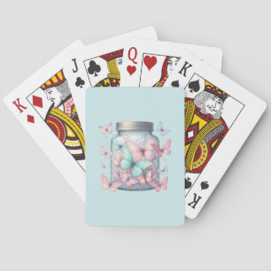 Fantasievolle Schmetterlinge in einem Glas Spielkarten