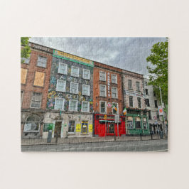 Farbenfrohe Bachelor's Walk in Dublin, Irland Puzzle