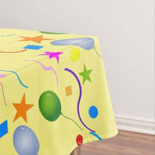 Farbenfrohe Ballons und Streamer auf YELLOW Tischdecke