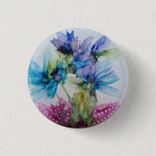 Farbenfrohe blaue Lila rosa grüne Blumenkunst Button