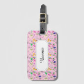 Farbenfrohe Blume auf rosa Gepäckanhänger (Vorderseite Vertikal)
