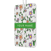 Farbenfrohe Blume, blauer Hintergrund, grün Autolufterfrischer (Links)