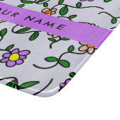 Farbenfrohe Blume, blauer Hintergrund, Lila Schneidebrett (Ecke)