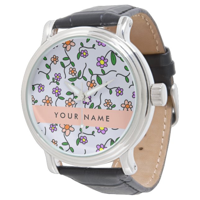 Farbenfrohe Blume, blauer Hintergrund, orange Armbanduhr (Schrägansicht)