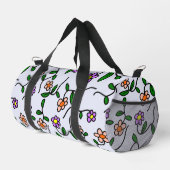 Farbenfrohe Blume, blauer Hintergrund, orange Duffle Bag (Rechte Ecke)