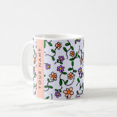 Farbenfrohe Blume, blauer Hintergrund, orange Kaffeetasse (Vorderseite Links)