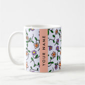 Farbenfrohe Blume, blauer Hintergrund, orange Kaffeetasse (Links)