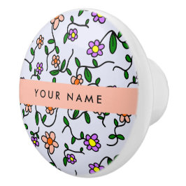 Farbenfrohe Blume, blauer Hintergrund, orange Keramikknauf