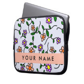 Farbenfrohe Blume, blauer Hintergrund, orange Laptopschutzhülle (Vorderseite Links)