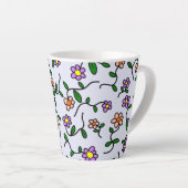 Farbenfrohe Blume, blauer Hintergrund, orange Milchtasse (Rechte Ecke)