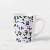 Farbenfrohe Blume, blauer Hintergrund, orange Milchtasse (Rechts)