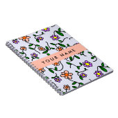 Farbenfrohe Blume, blauer Hintergrund, orange Notizblock (Rechte Seite)