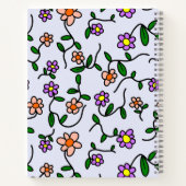 Farbenfrohe Blume, blauer Hintergrund, orange Notizblock (Rückseite)
