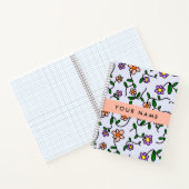 Farbenfrohe Blume, blauer Hintergrund, orange Notizblock (Innenseite)