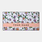 Farbenfrohe Blume, blauer Hintergrund, orange Schreibtischunterlage (Vorderseite)