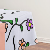 Farbenfrohe Blume, blauer Hintergrund, orange Tischdecke (Beispiel)