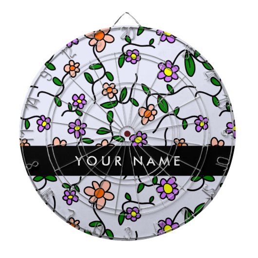 Farbenfrohe Blume, blauer Hintergrund, schwarz Dartscheibe (vorne)