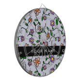 Farbenfrohe Blume, blauer Hintergrund, schwarz Dartscheibe (Vorderseite Links)