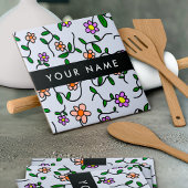 Farbenfrohe Blume, blauer Hintergrund, schwarz Fliese