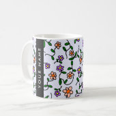 Farbenfrohe Blume, blauer Hintergrund, schwarz Kaffeetasse (Vorderseite Links)
