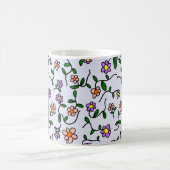 Farbenfrohe Blume, blauer Hintergrund, schwarz Kaffeetasse (Mittel)