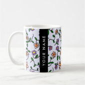 Farbenfrohe Blume, blauer Hintergrund, schwarz Kaffeetasse (Links)