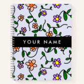 Farbenfrohe Blume, blauer Hintergrund, schwarz Notizblock (Vorderseite)
