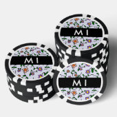 Farbenfrohe Blume, blauer Hintergrund, schwarz Pokerchips (Stapel)