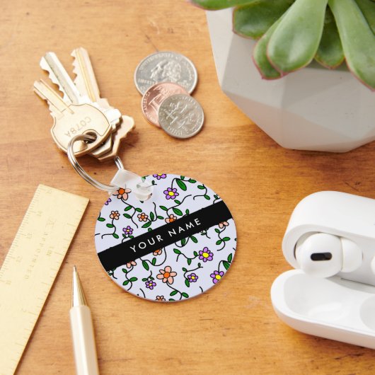 Farbenfrohe Blume, blauer Hintergrund, schwarz Schlüsselanhänger (Schreibtisch)