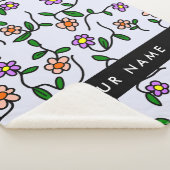 Farbenfrohe Blume, blauer Hintergrund, schwarz Sherpadecke (3/4)
