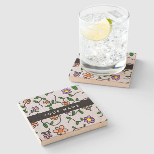 Farbenfrohe Blume, blauer Hintergrund, schwarz Steinuntersetzer