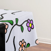 Farbenfrohe Blume, blauer Hintergrund, schwarz Tischdecke (Beispiel)
